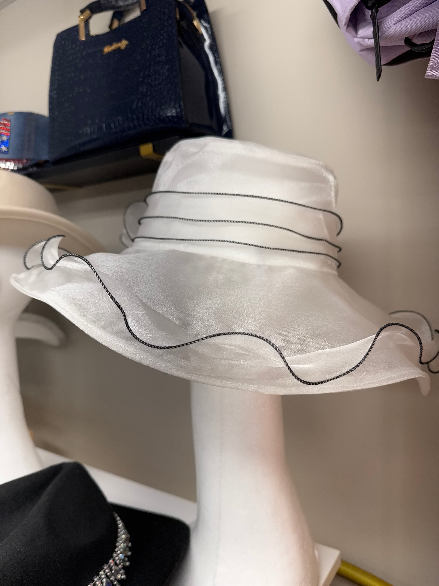 White with black accent hat